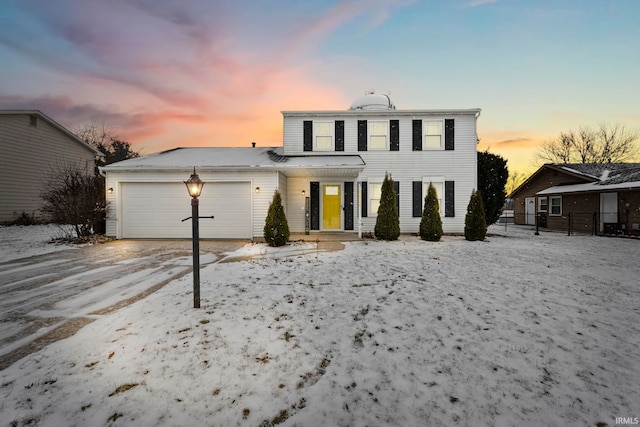 view of front property with a garage