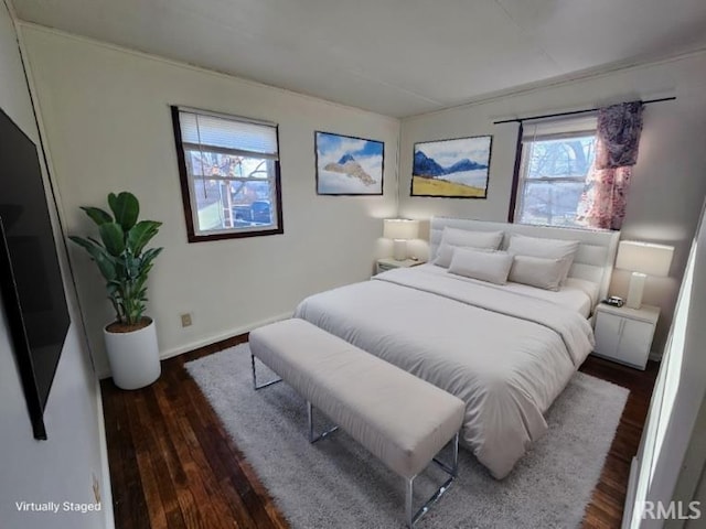 bedroom featuring dark wood-type flooring