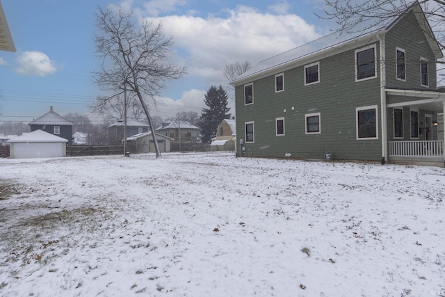 view of snow covered house