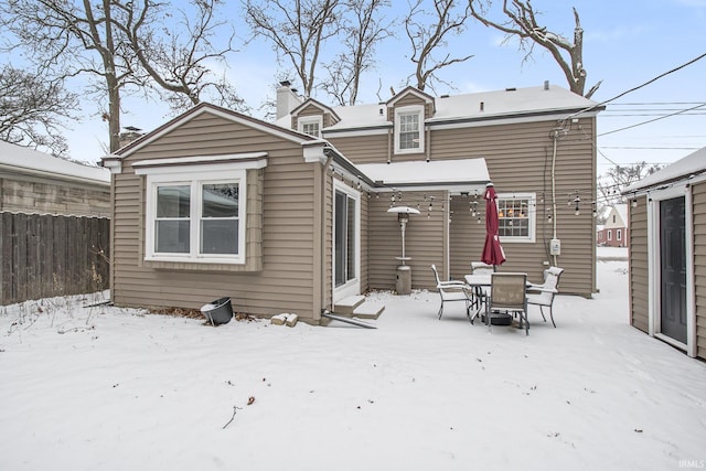 view of snow covered house