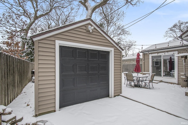 view of snow covered garage