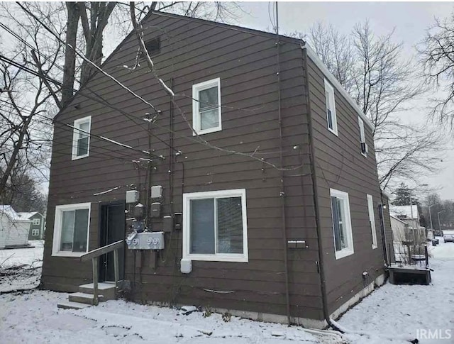 view of snow covered property