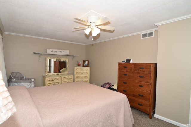 carpeted bedroom with ceiling fan and ornamental molding