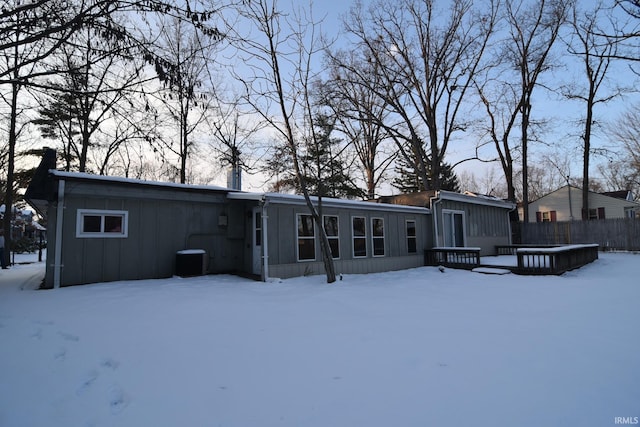 view of snow covered house