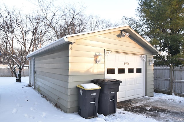 view of snow covered garage