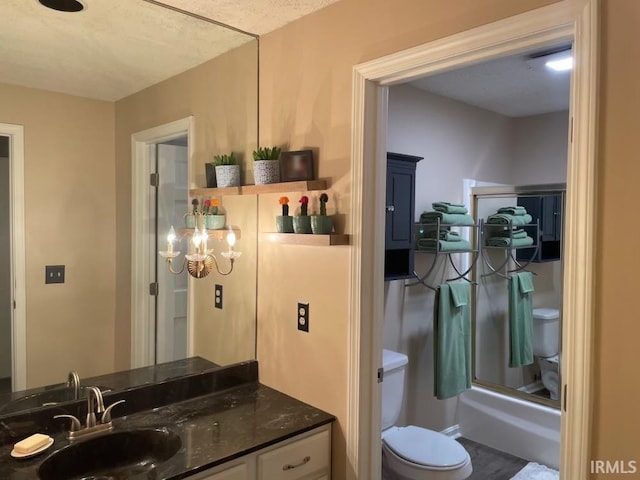 bathroom with hardwood / wood-style floors, vanity, and toilet