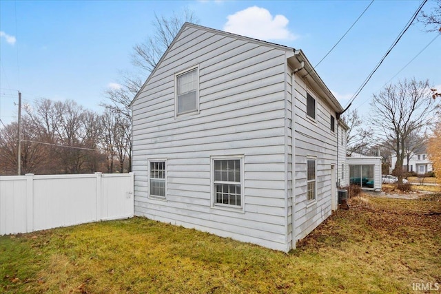 view of home's exterior featuring a lawn