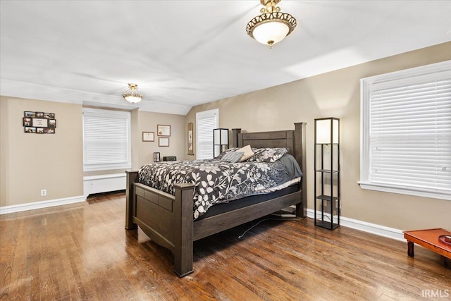 bedroom with wood-type flooring