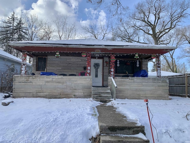 view of front of home featuring covered porch