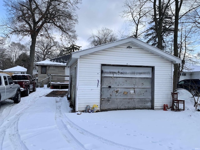 view of snow covered garage