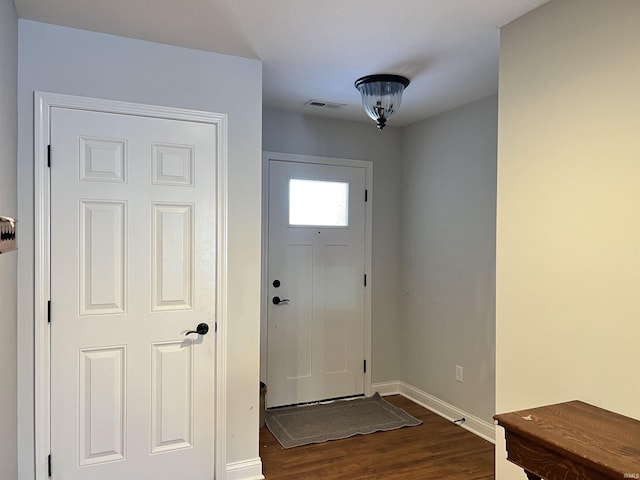 doorway featuring dark hardwood / wood-style floors