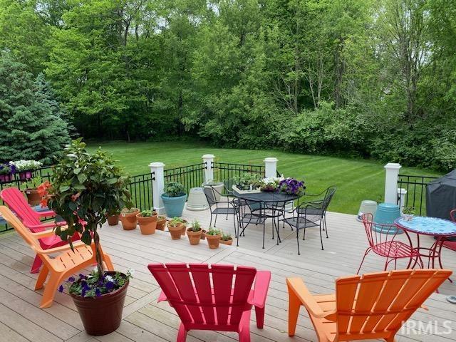 deck featuring a lawn