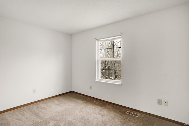 view of carpeted spare room