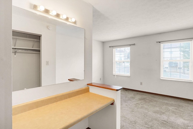 bathroom with a textured ceiling