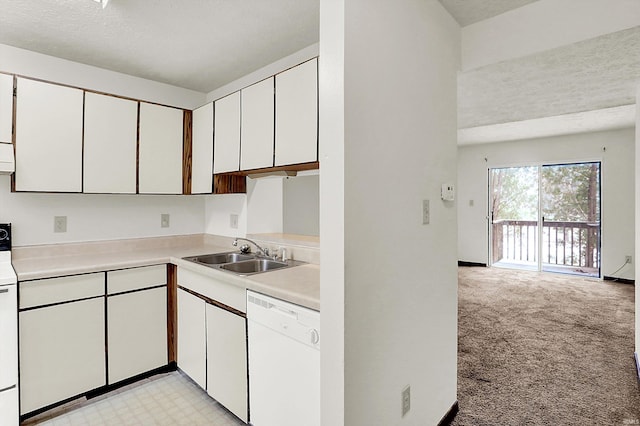 kitchen with dishwasher, sink, light colored carpet, a textured ceiling, and white cabinets