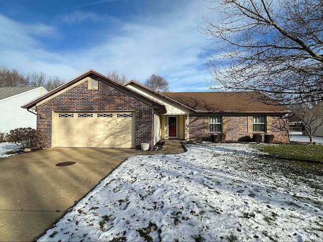 ranch-style house featuring a garage