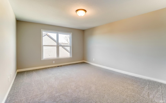 empty room with carpet floors