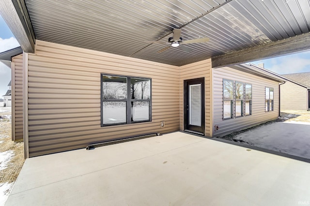 view of patio with ceiling fan