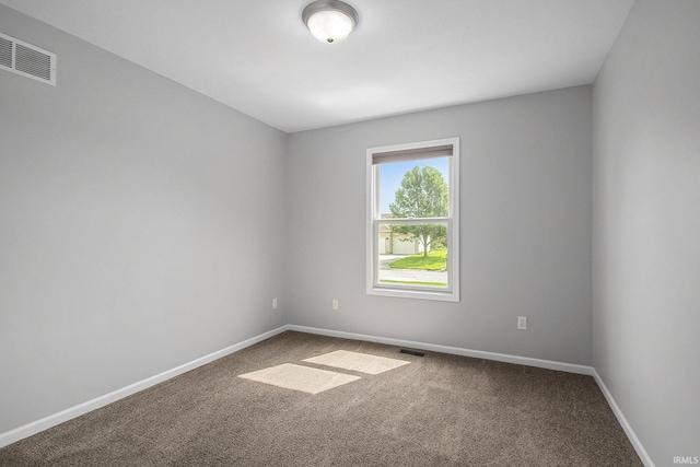 view of carpeted spare room