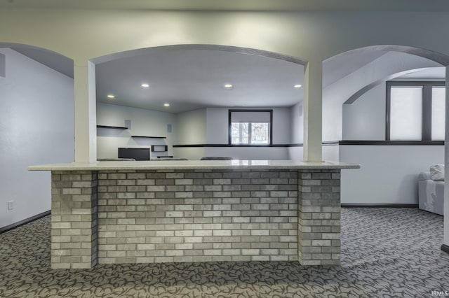 kitchen with carpet flooring