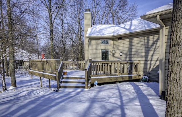 view of snow covered deck