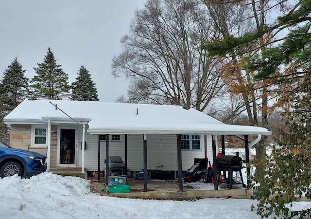 view of front of house featuring a carport