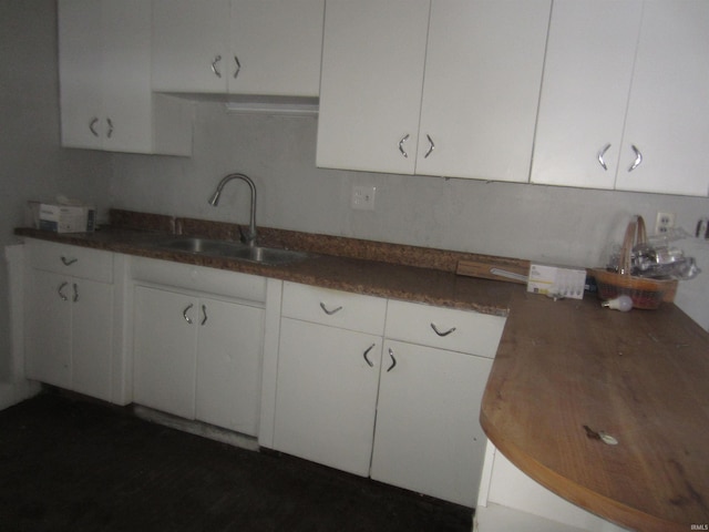 kitchen with white cabinets and sink