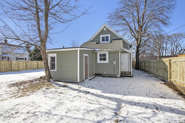 view of snow covered property