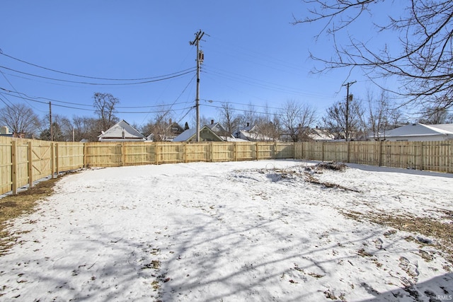 view of yard covered in snow