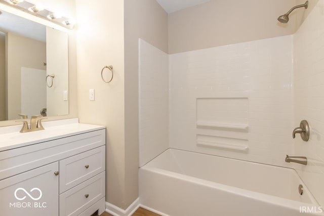 bathroom featuring vanity and shower / bathing tub combination