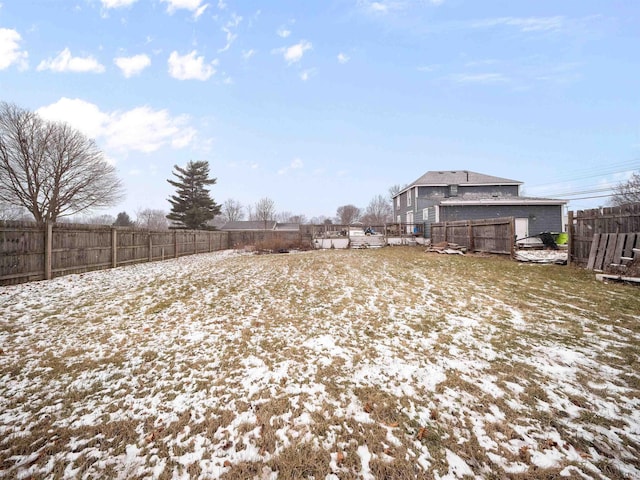 view of yard covered in snow