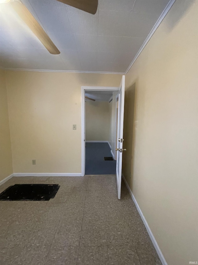 corridor featuring ornamental molding