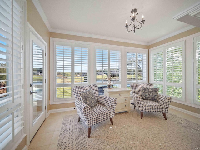 sunroom featuring an inviting chandelier and a wealth of natural light