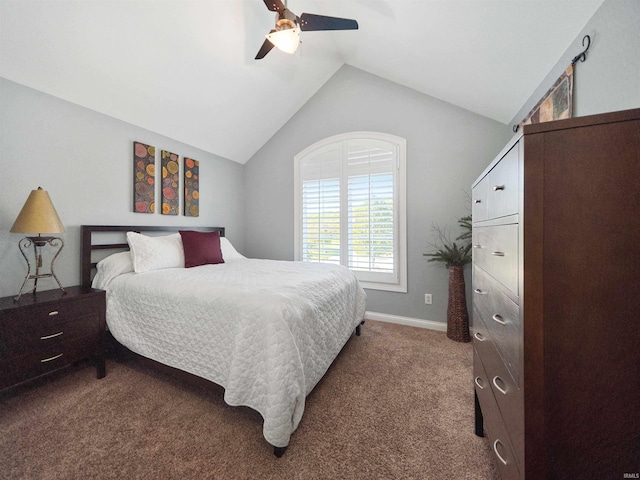 carpeted bedroom featuring ceiling fan and vaulted ceiling