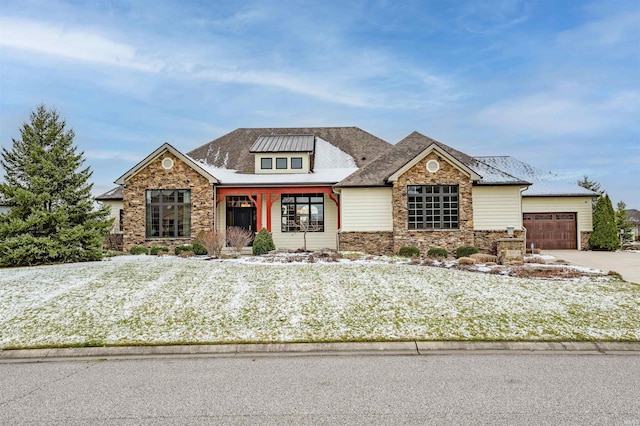 view of front of property featuring a garage