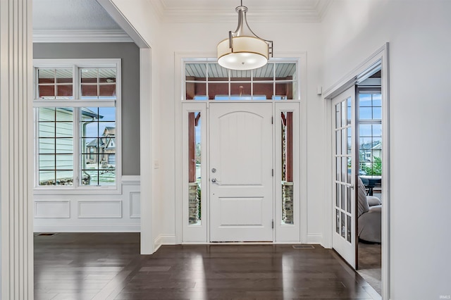 entryway featuring dark hardwood / wood-style flooring and crown molding