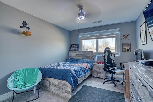 carpeted bedroom featuring ceiling fan