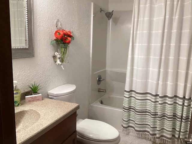 full bathroom featuring shower / bathtub combination with curtain, vanity, and toilet