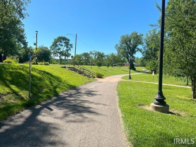 surrounding community featuring a lawn