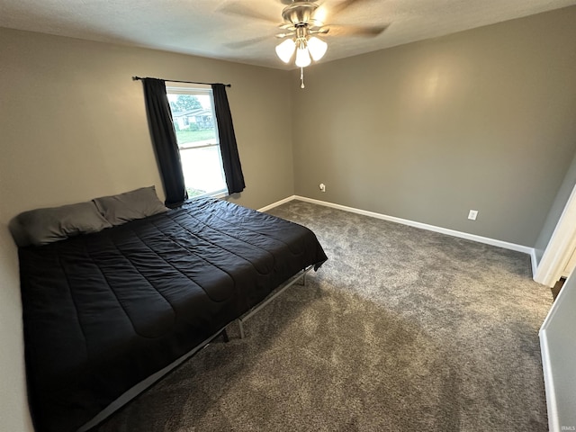 unfurnished bedroom with carpet floors and ceiling fan