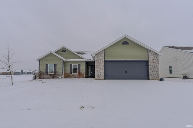 single story home featuring a garage