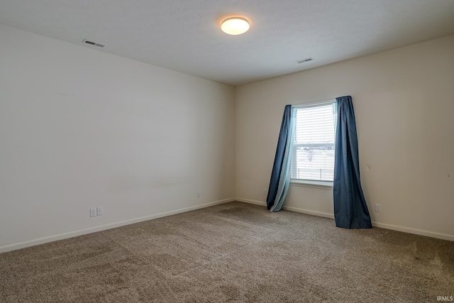 unfurnished room with carpet