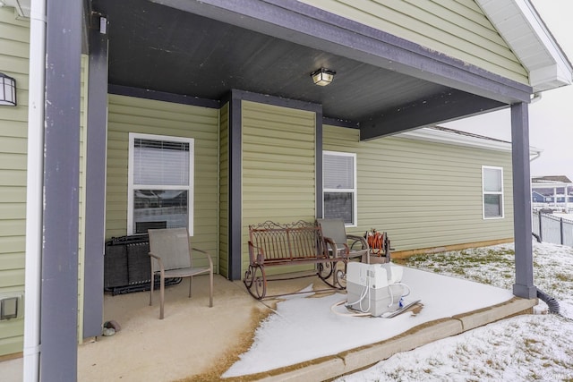 view of snow covered patio