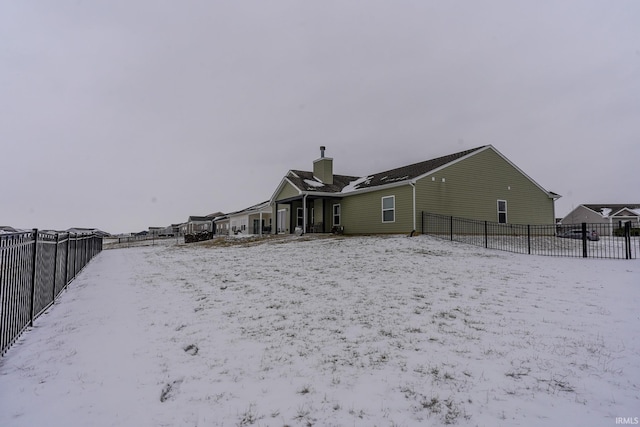 view of snow covered property