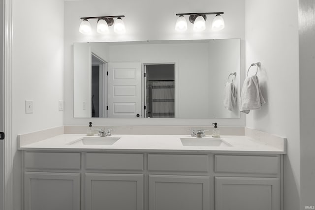 bathroom with vanity and walk in shower