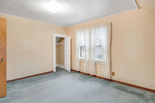 spare room featuring carpet