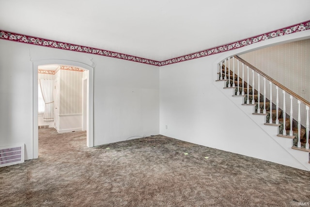 unfurnished room with carpet floors