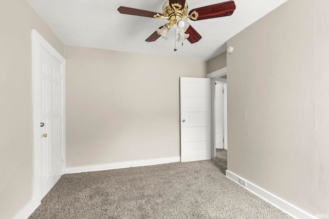 unfurnished room with carpet flooring and ceiling fan