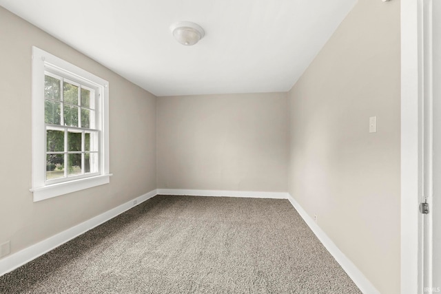 empty room featuring carpet flooring