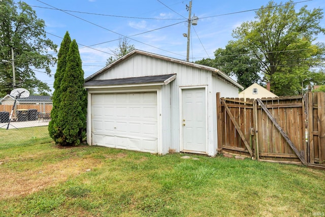 garage with a lawn